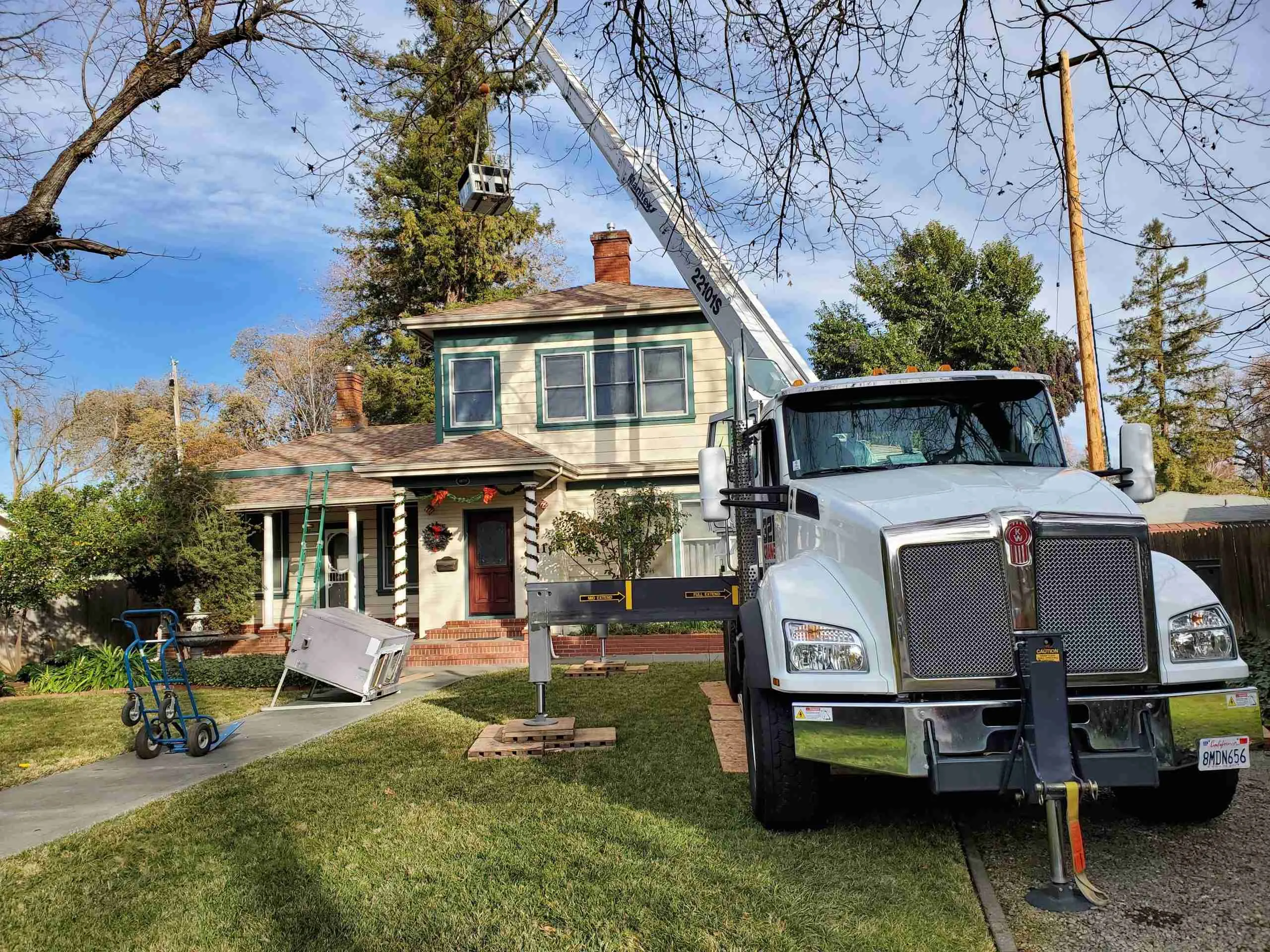HVAC technician performing a repair in Franklin